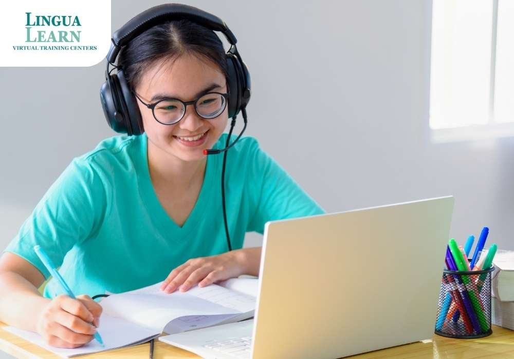 a woman with sunglasses using a laptop