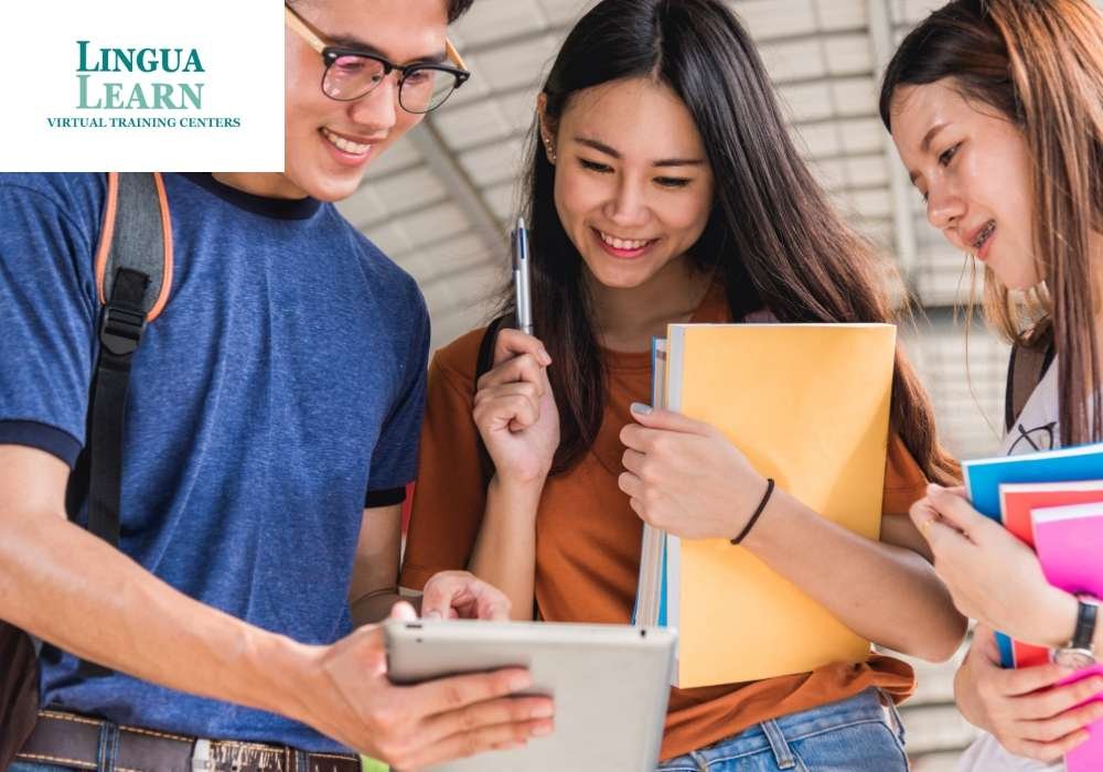 discussion of 3 students using tablet