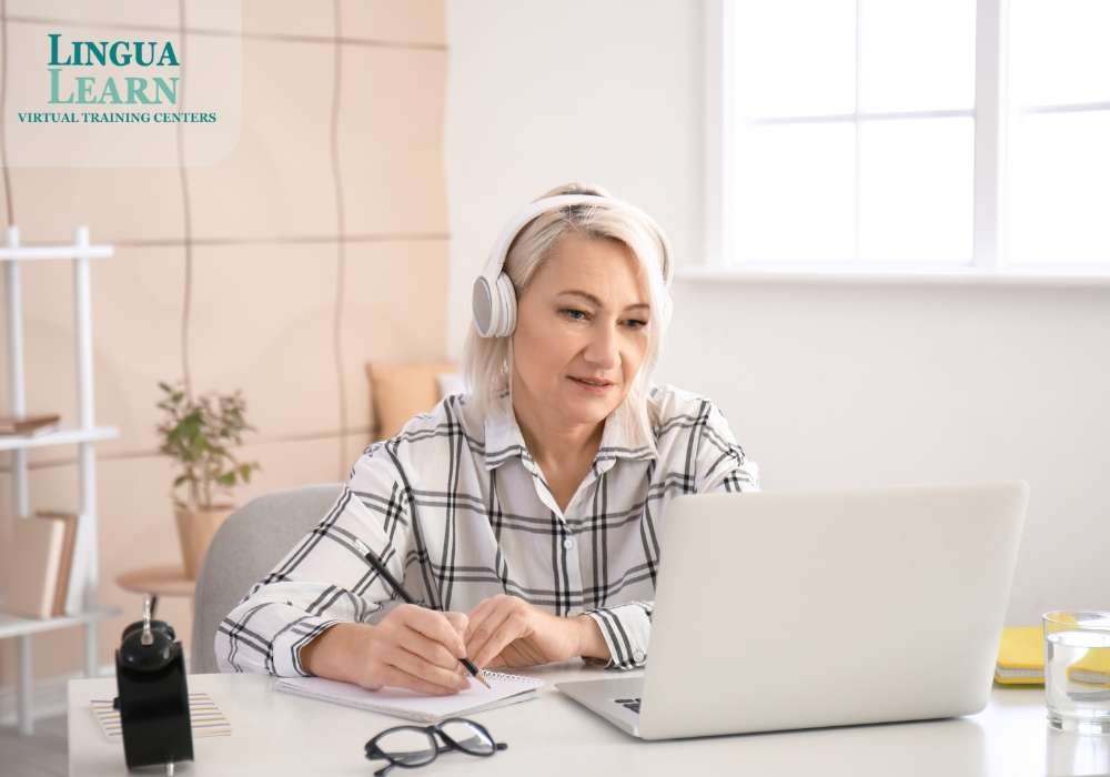 old lady using laptop and headset